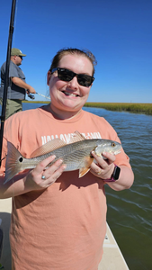 Waves applaud, Folly Beach's angler's show.